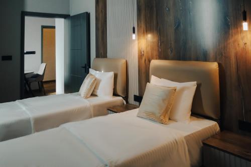 Postel nebo postele na pokoji v ubytování Hotel Blue Corner 2
