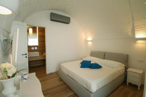 En eller flere senge i et værelse på Casa Maristella