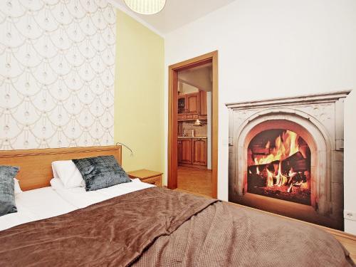 Ένα ή περισσότερα κρεβάτια σε δωμάτιο στο Apartament Starogdański 22