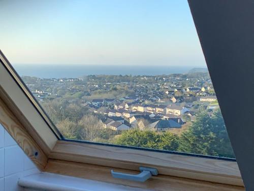 a view of a town from a window at Flat 18 Pochin House in St Austell