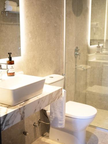 Un baño de Divina Tower Apart Hotel