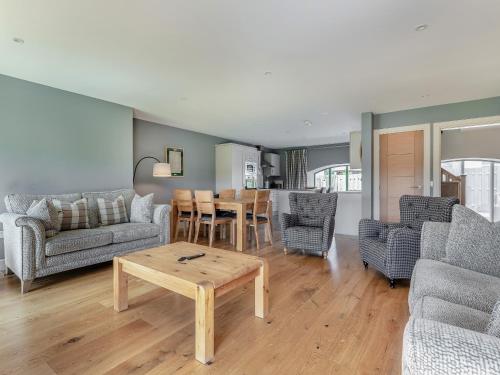 a living room with a couch and a table at Mayflower - Uk43632 in Grange