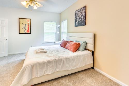 a bedroom with a bed in a room at 10 Mi to Keeneland Family Home with Deck and Yard in Lexington