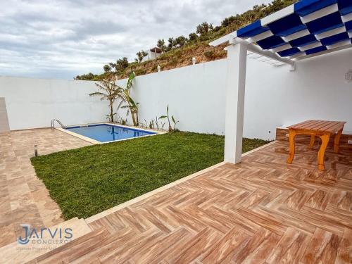 Бассейн в Villa avec terrasse S2 piscine jardin Rafraf или поблизости