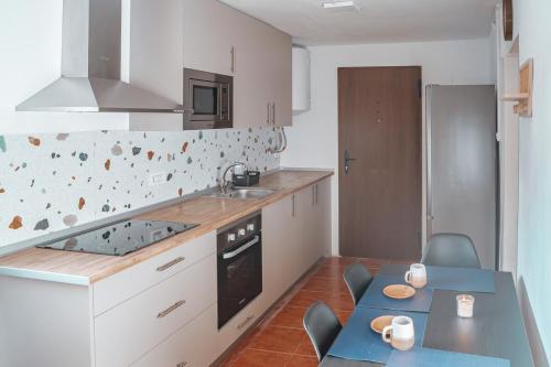 Η κουζίνα ή μικρή κουζίνα στο La Suerte Apartamento rural