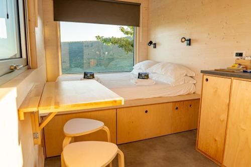 Giường trong phòng chung tại Una stanza in Valpolicella - Friland