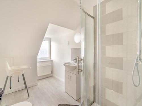 a bathroom with a shower and a sink at Apartment Six - Uk44288 in Arbroath