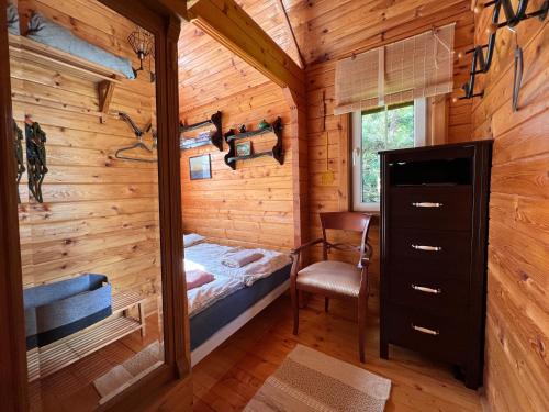 Imagen de la galería de Gietki - dom wypoczynkowy na wyłączność z linią brzegową, en Piasutno Ludwy