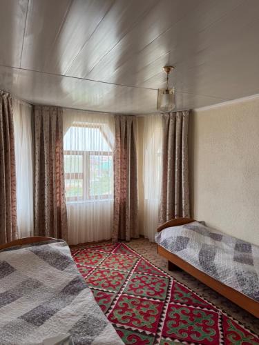 Ένα ή περισσότερα κρεβάτια σε δωμάτιο στο VIZITik