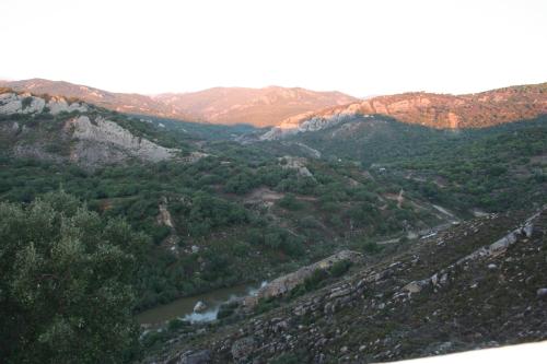 an aerial view of a river in a valley at Posada La Casa Grande in Jimena de la Frontera