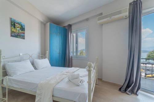 Katil atau katil-katil dalam bilik di Giorgio studios-apartments 2