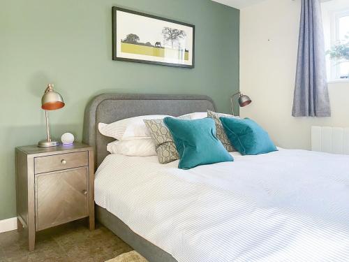 Voodi või voodid majutusasutuse Honey Bee Cottage toas