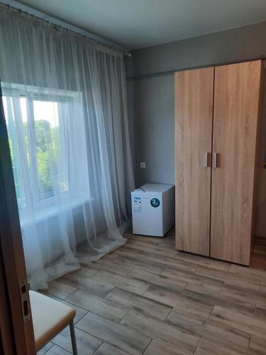 a room with a room with a door and a window at Solmaris in Odesa