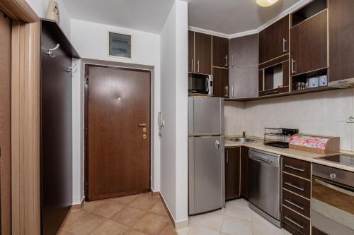 Cuisine ou kitchenette dans l'établissement Alpha Centrum