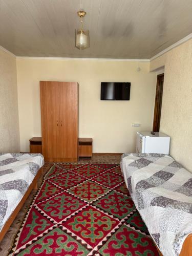 Ένα ή περισσότερα κρεβάτια σε δωμάτιο στο VIZITik