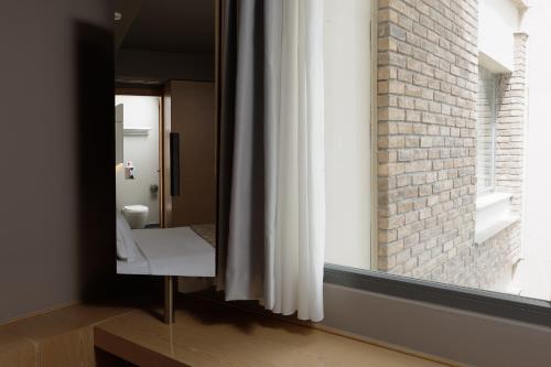 Koupelna v ubytování Elysion Hotel