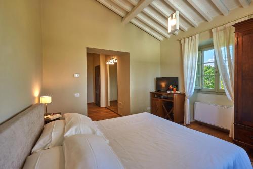 Postel nebo postele na pokoji v ubytování Resort 37