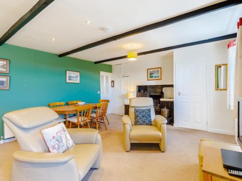 Et opholdsområde på Dovecoat Cottage