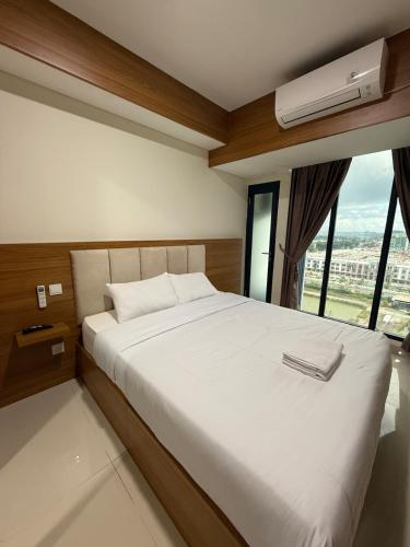 Katil atau katil-katil dalam bilik di Pollux Habibie Superior By Superstay