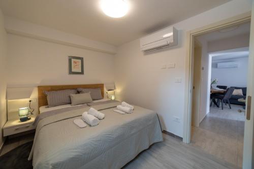 Postel nebo postele na pokoji v ubytování Apartman Zvane
