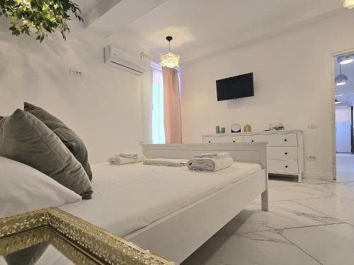 TV a/nebo společenská místnost v ubytování Hostel Cazino Nord Rooms