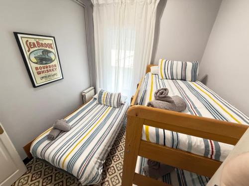 Postel nebo postele na pokoji v ubytování Cal Cinto · Apartamento rústico y renovado 7p