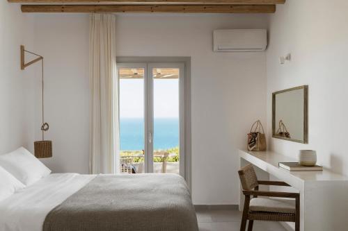 Postel nebo postele na pokoji v ubytování Gerofinikas Boutique Hotel