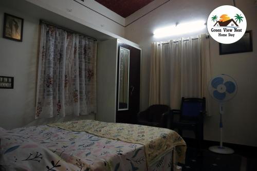 Cama o camas de una habitación en Green View Nest Home Stay