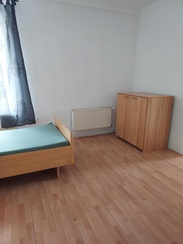 Una cama o camas en una habitación de Apartment for recreation in the district of Děčín