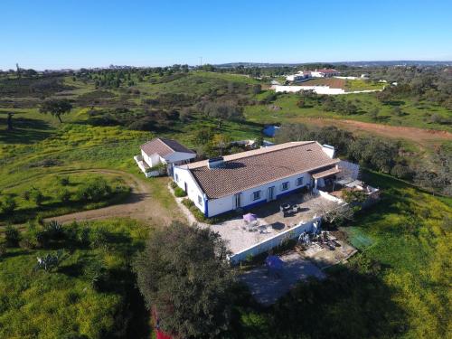 an aerial view of a house in a field at Madrugada in Évora