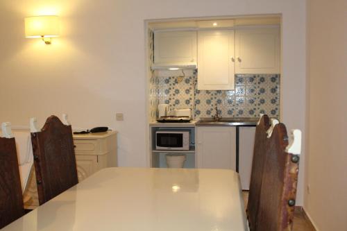 Η κουζίνα ή μικρή κουζίνα στο Cheerfulway Minichoro Apartamentos