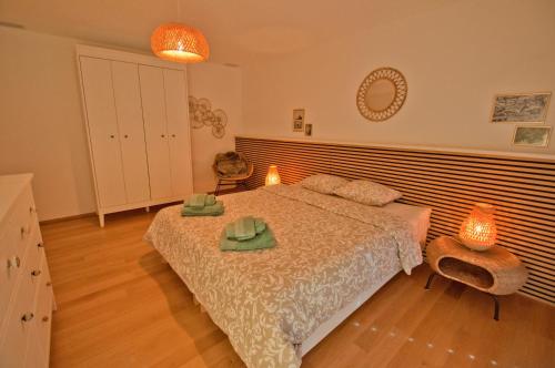 Postel nebo postele na pokoji v ubytování Chalet Sunnustrahl