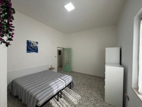 Postel nebo postele na pokoji v ubytování Giulialidohome