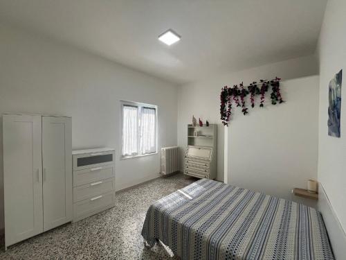 Postel nebo postele na pokoji v ubytování Giulialidohome