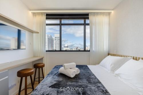 Postel nebo postele na pokoji v ubytování Estadia confortável e completa no Centro de Curitiba - ECL