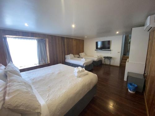 Postel nebo postele na pokoji v ubytování Hotel Lagoluz