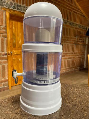 a white blender sitting on top of a counter at Watzara Wasi Dpt Familiar cerca de Cuicocha in Cotacachi