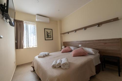 Katil atau katil-katil dalam bilik di Quattro Venti Case Vacanze
