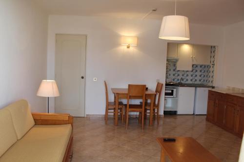 Χώρος καθιστικού στο Cheerfulway Minichoro Apartamentos