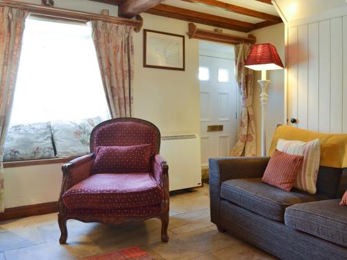 Posezení v ubytování Kate's Cottage