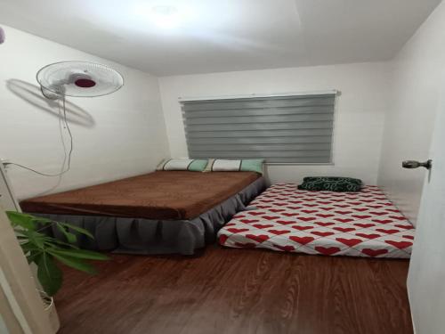 Ένα ή περισσότερα κρεβάτια σε δωμάτιο στο Amigas Transient House