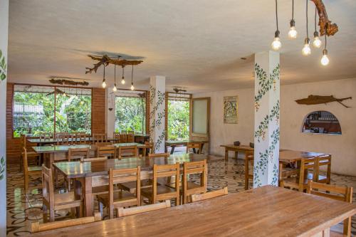 Restaurace v ubytování Cabañas Armonía y Jardín de Orquídeas