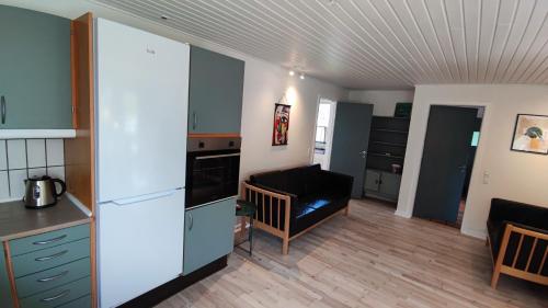 Kuchyň nebo kuchyňský kout v ubytování Købmandens Villa