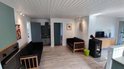 Kuchyň nebo kuchyňský kout v ubytování Købmandens Villa