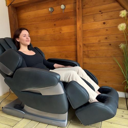 a woman sitting in an office chair at FACT Apartments in Arnoldstein