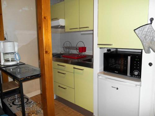 Η κουζίνα ή μικρή κουζίνα στο Appartement WIFI Monné centre Cauterets