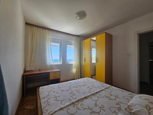 Ένα ή περισσότερα κρεβάτια σε δωμάτιο στο Apartment Jasovic