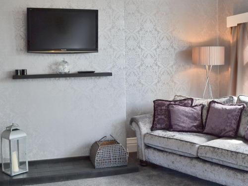 TV a/nebo společenská místnost v ubytování South Cliff Sands Ii