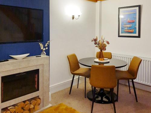 Et opholdsområde på Stable Cottage