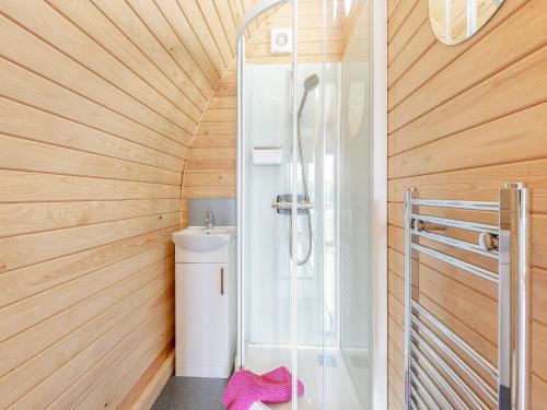 a bathroom with a glass shower and a toilet at Pod One - Uk44402 in Ross on Wye